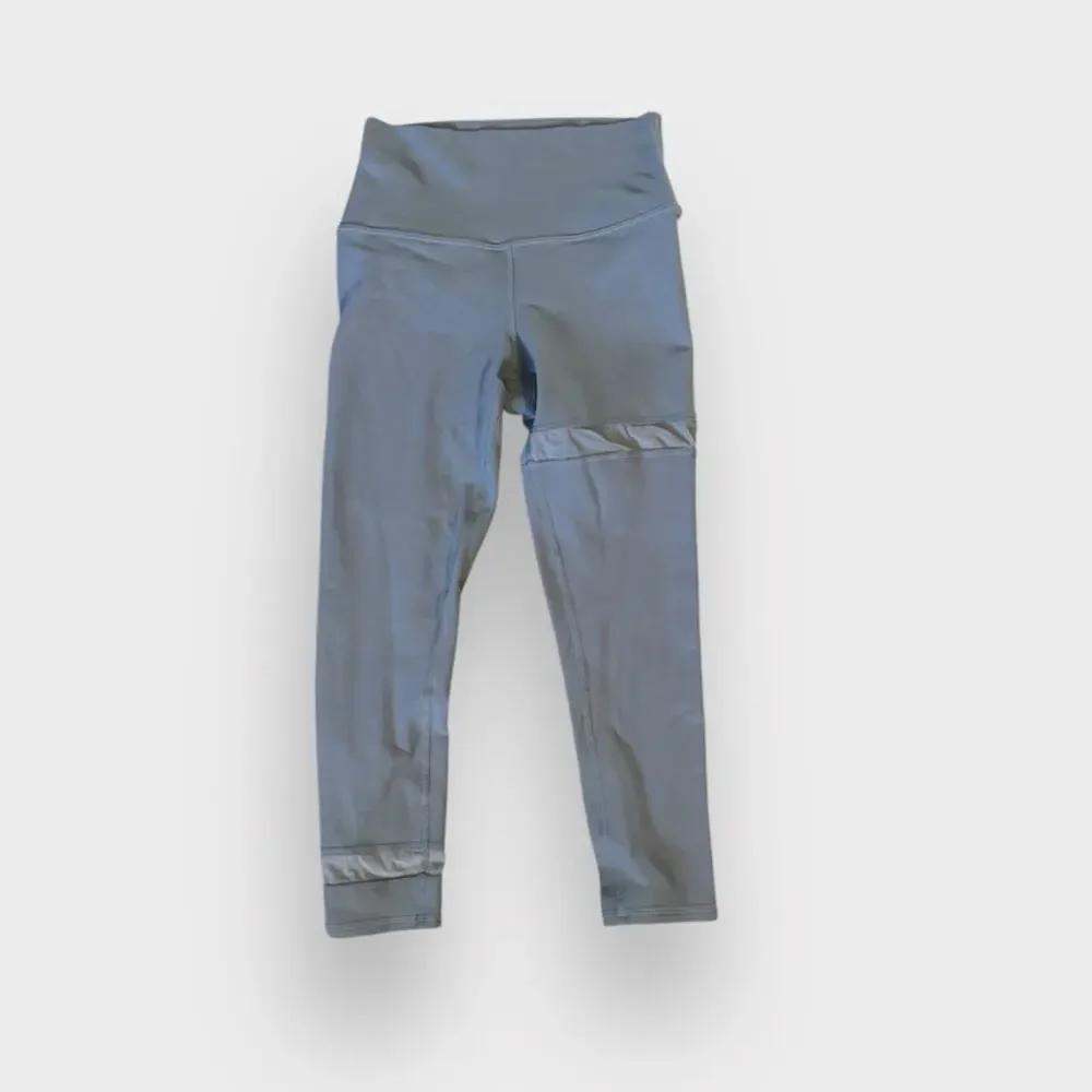 ALO Yoga light blue leggings with sheer mesh accent size XS